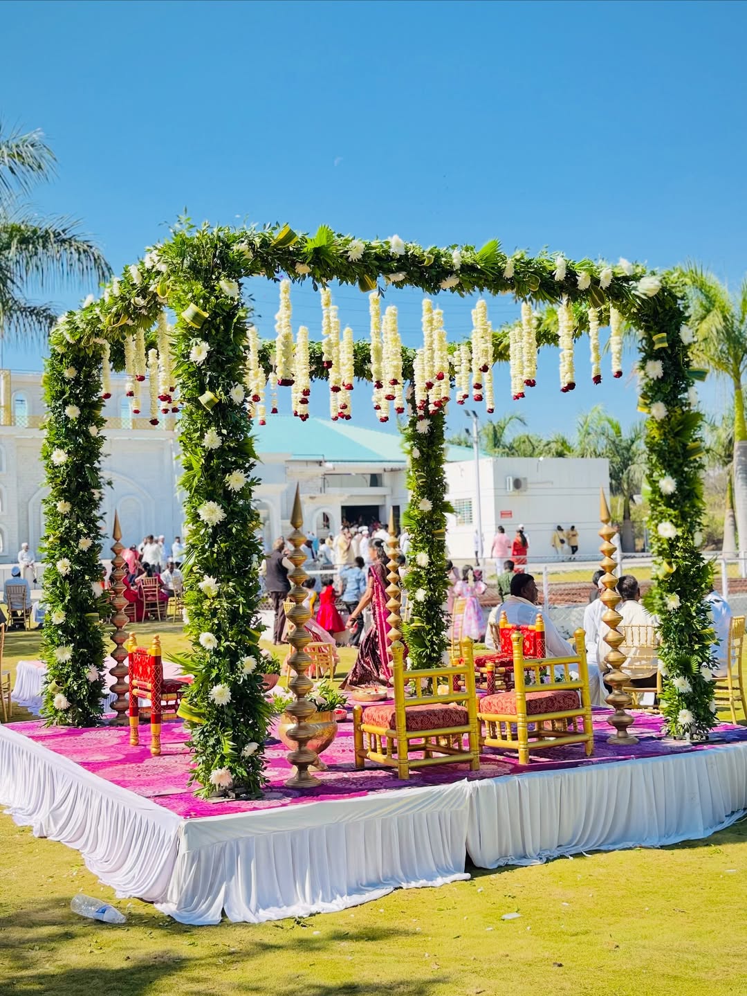 Green garland mandap built by Buddham Events